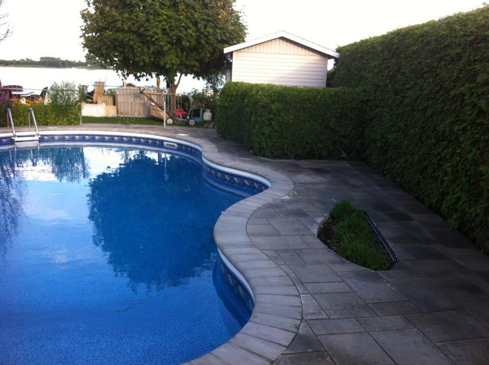 Pose de pavés unis pour piscine Repentigny